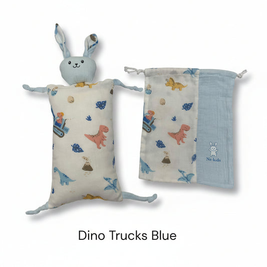 A baby sensory pillow and matching drawstring pouch set in a light blue and off-white fabric with a dinosaur and truck pattern, labeled 'Dino Trucks Blue'.